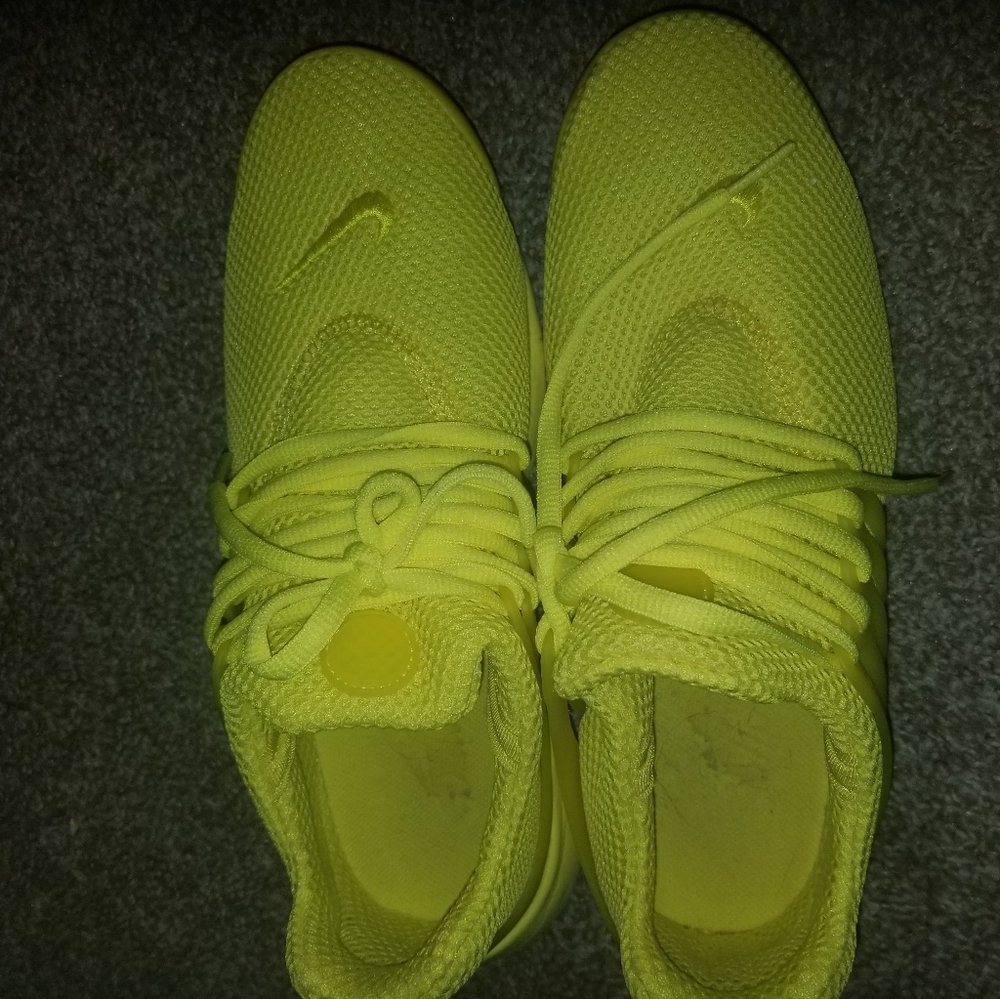 Yellow Nike shoes